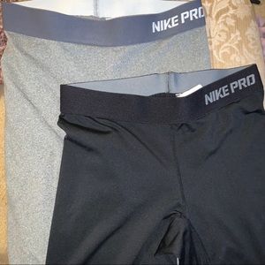 Two Nike pro tights Capri length